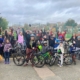 Adults and children on their bikes
